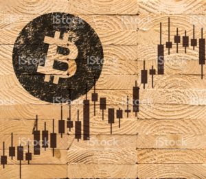 Cryptocurrency concept (Bitcoin chart on the plank)4