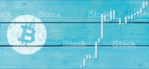 Cryptocurrency concept (Bitcoin chart on the plank)8